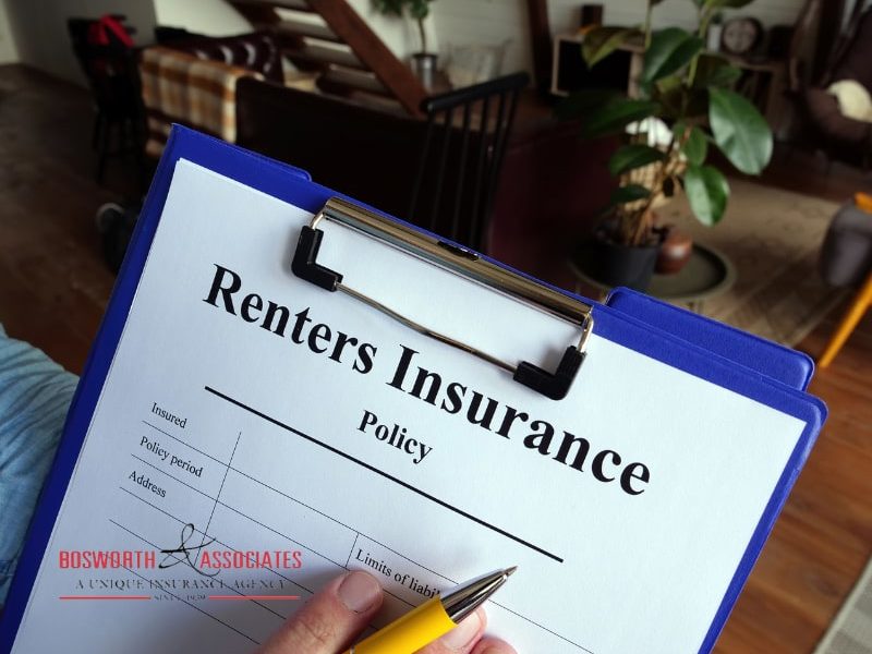 A person fills out a renters insurance form