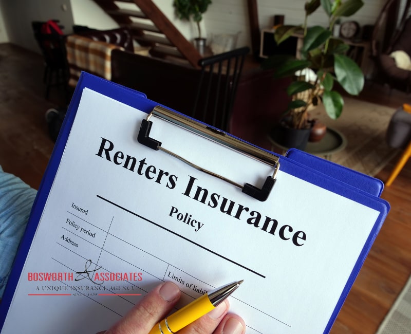 A person fills out a renters insurance form