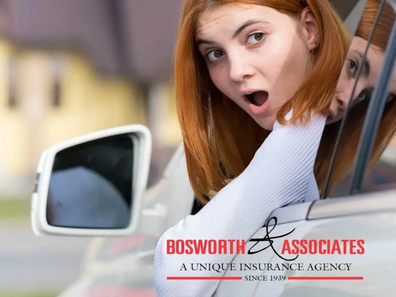 Bosworth and Associates Logo and a woman in her car that has been rear-ended in a car accident