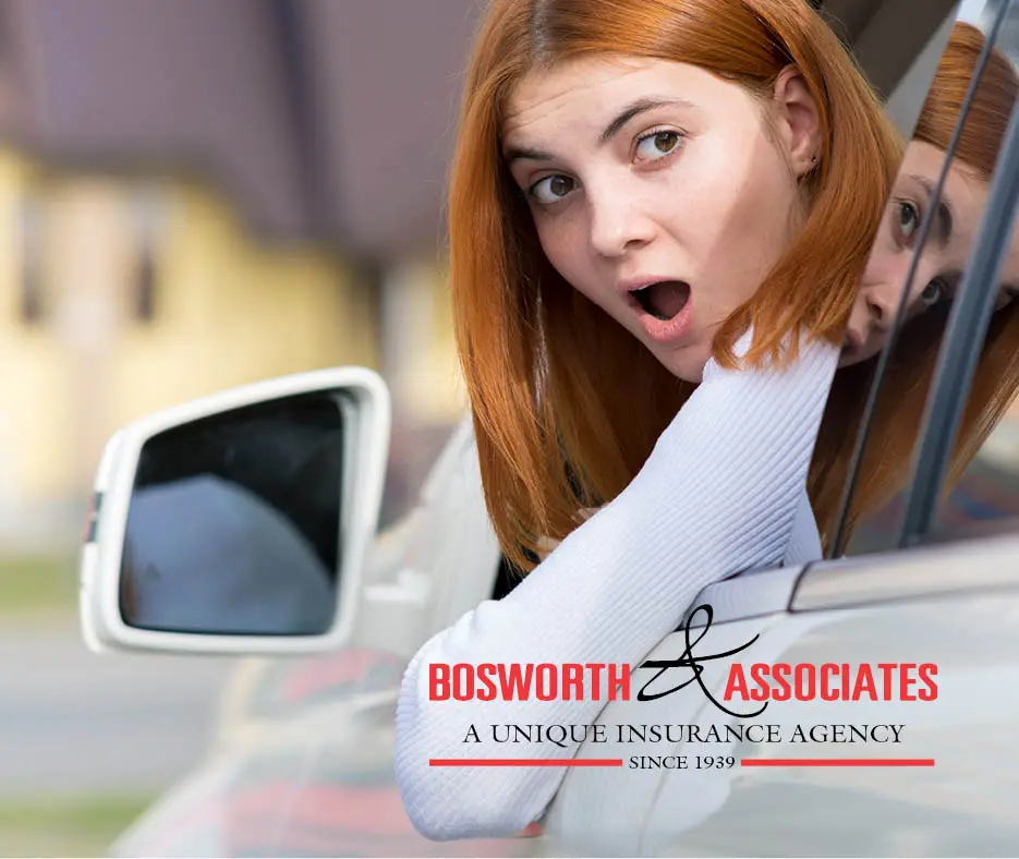 Bosworth and Associates Logo and a woman in her car that has been rear-ended in a car accident