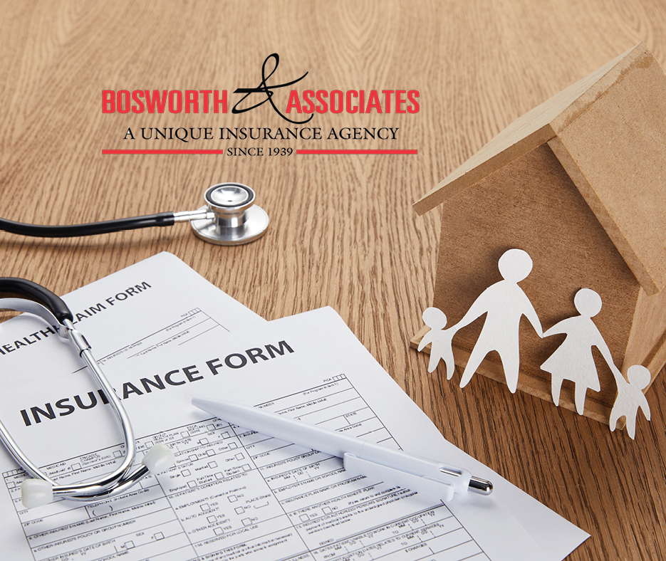 insurance forms on a desk with the bosworth logo