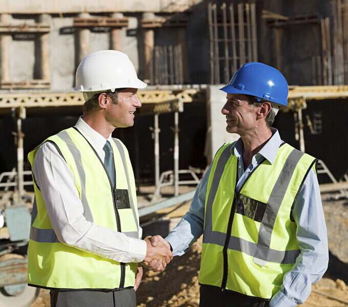 construction professionals shaking hands